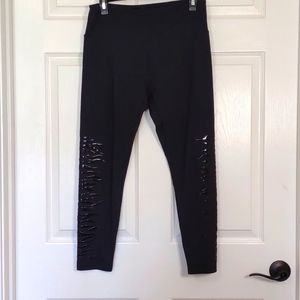Marika black leggings size large, zebra striped pattern detailing